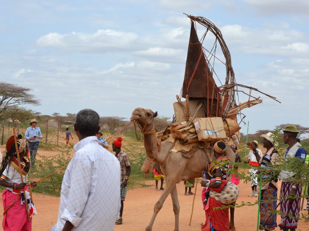 Guests-from-Kenya-and-beyond-to-witness-the-‘Bibles-return-by-their-treasured-animal-the-camel.-1024x767.jpg